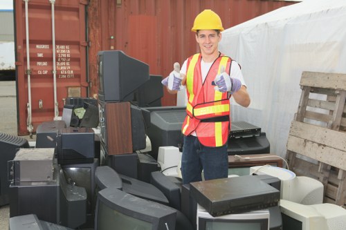 A team of professionals conducting flat clearance in Woodgreen